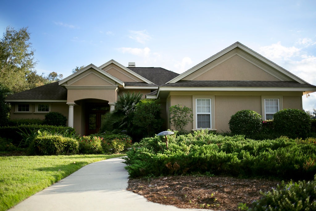 Suburban house with landscaped garden and curved walkway
