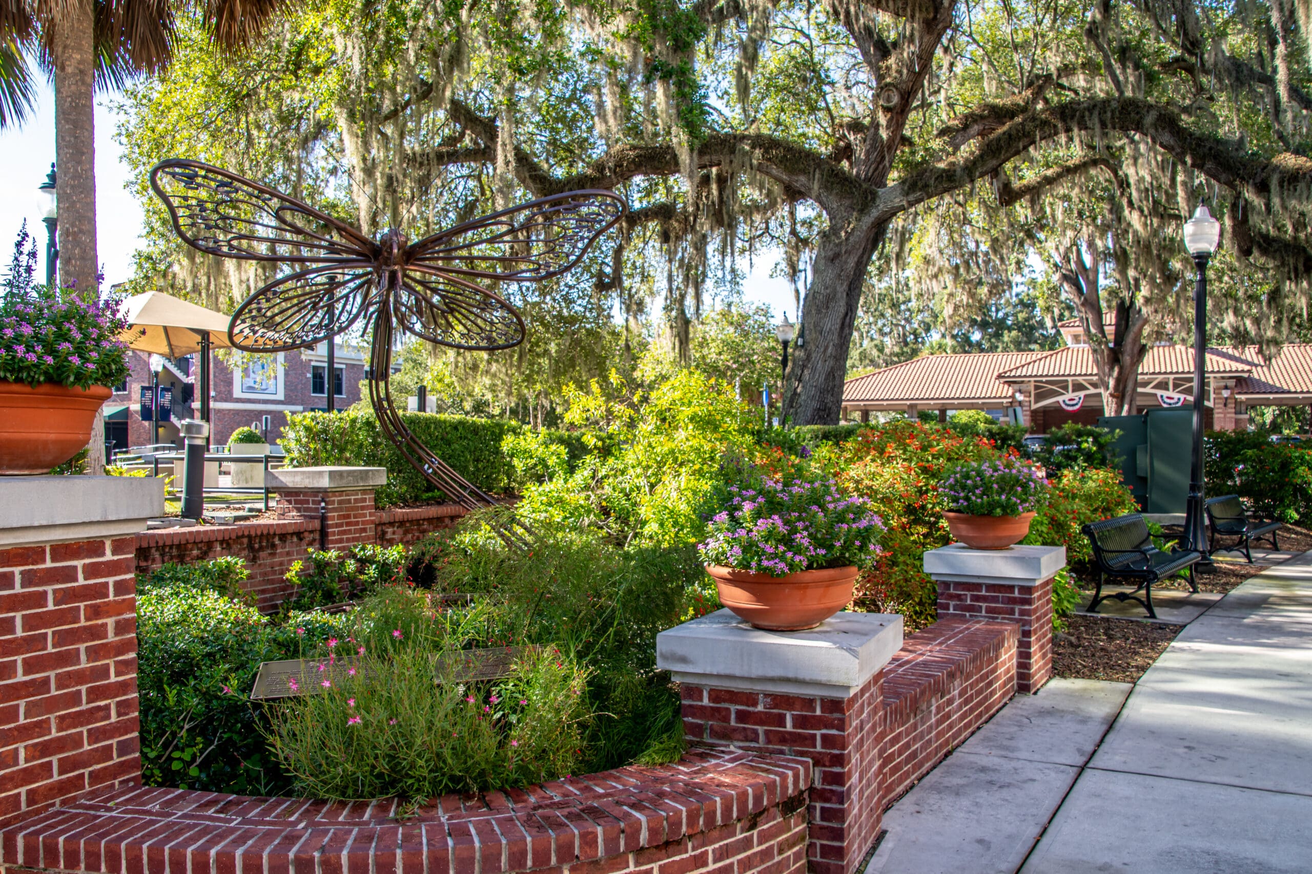 A beautiful front yard with large trees.